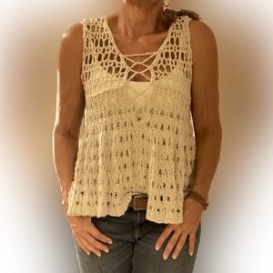 Free people cream color, crochet flare bottom top. Size s